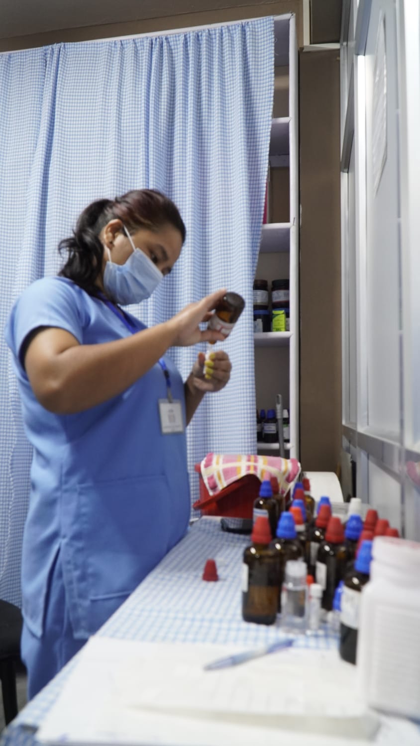 Dr. Papang preparing medicine